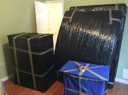 Furniture wrapped in protective materials